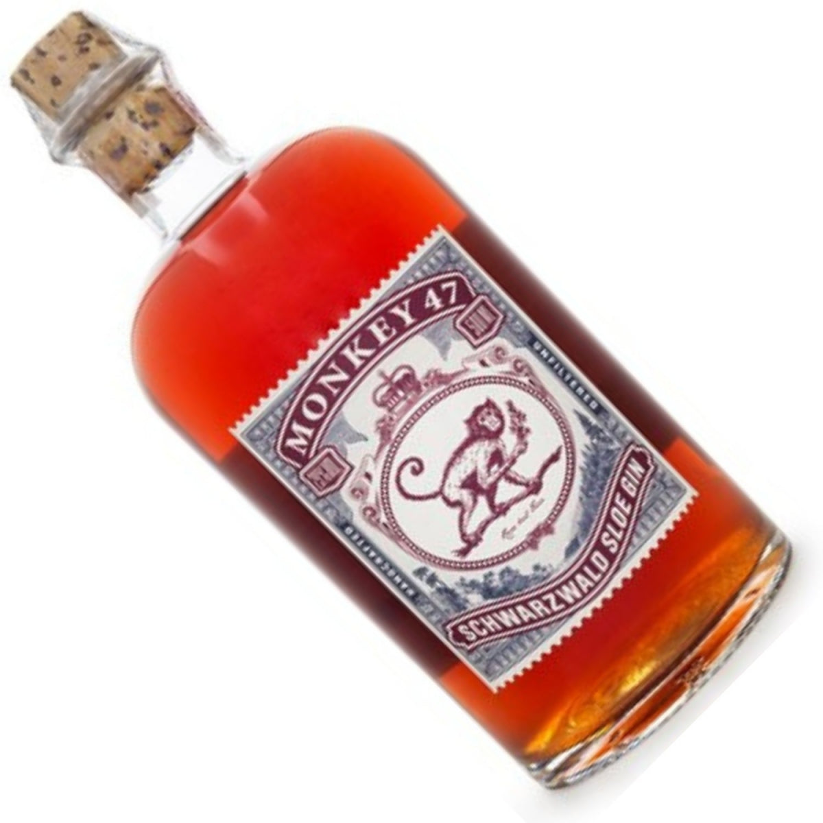 Garrafa Monkey 47 Schwarzwald Sloe Gin inclinada, mostrando o líquido âmbar e o rótulo frontal.