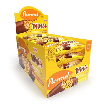 Caixa display amarela Flormel Mini+ com bombons de amendoim, indicando 16 unidades de 12 g e zero adição de açúcares.