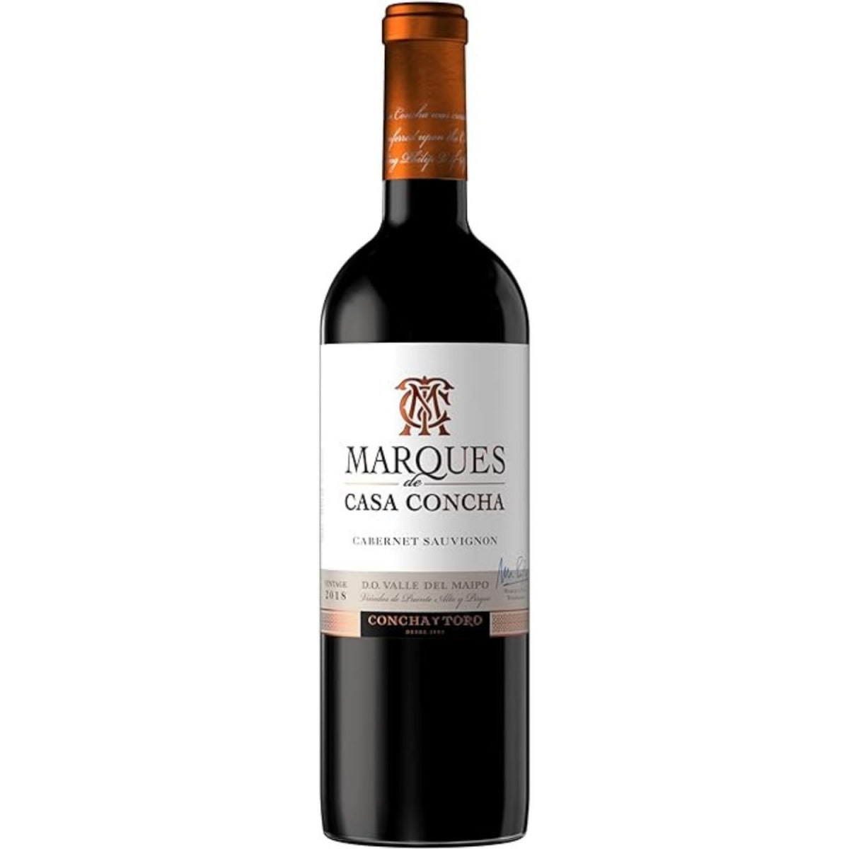 Garrafa de vinho tinto Marques de Casa Concha Cabernet Sauvignon, com rótulo branco e cápsula cobre.
