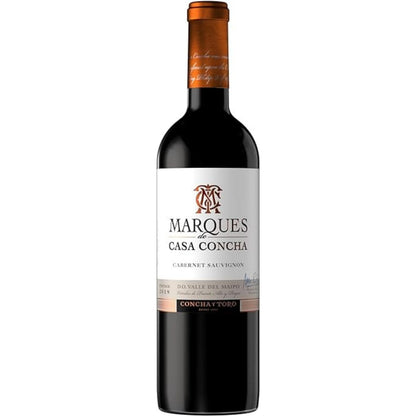 Garrafa de vinho tinto Marques de Casa Concha Cabernet Sauvignon, com rótulo branco e cápsula cobre.