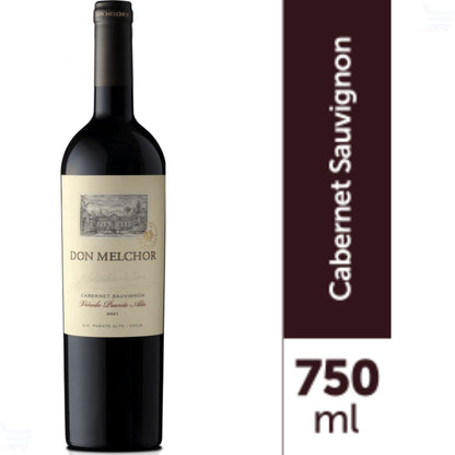 Garrafa de vinho Don Melchor Cabernet Sauvignon com indicação de 750 ml; o rótulo mostra a safra 2021.
