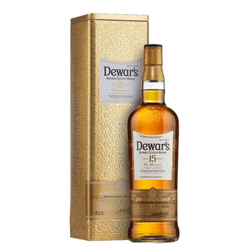 Garrafa Dewar's The Monarch 15 anos ao lado do estojo metálico dourado.